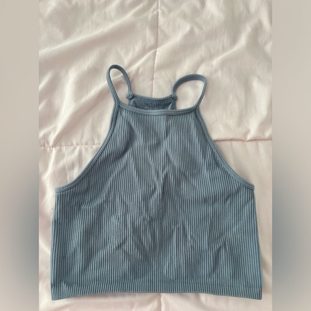 stretchy blue cropped tank top.